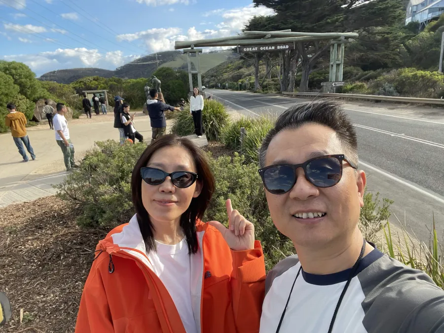 Hommer Zhao at the Great Ocean Road entrance in Australia